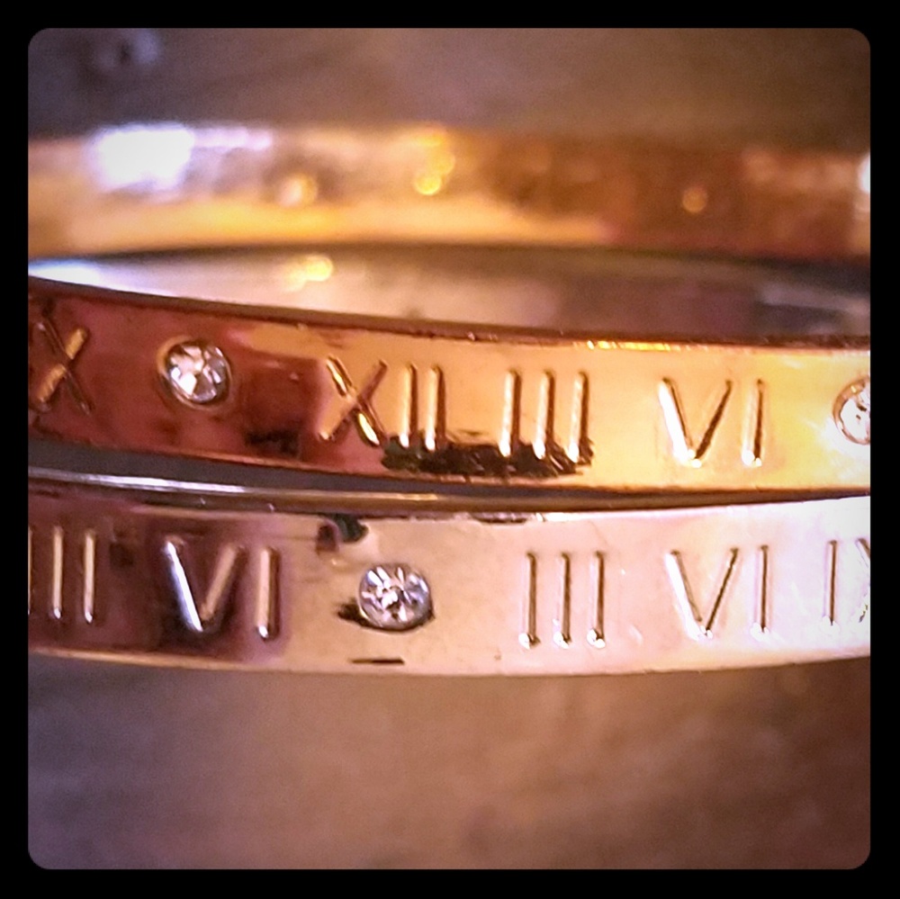 2 name brand gold and silver bracelets